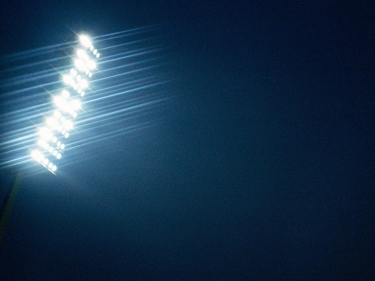 stadium lights against the night sky